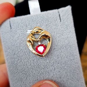 10k gold, ruby, and diamond Mother and child pendant